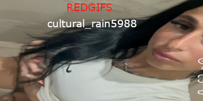 tatted up brunette pissing